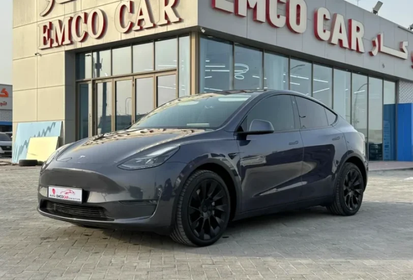 tesla model Y at emco cars showroom used cars dealer in Abu Dhabi