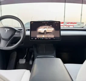 a car with a touch screen tesla model y